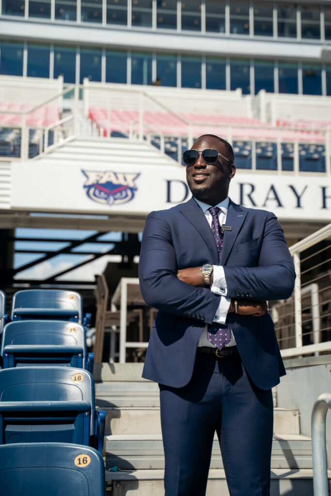 Attorney Kweku Darfoor standing in the FAU stadium stands